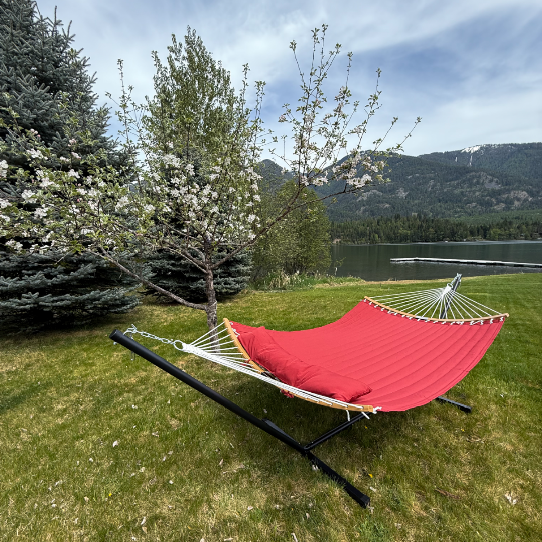 Montana lake house rental for families — Bull Lake deck with private dock and Cabinet Mountains