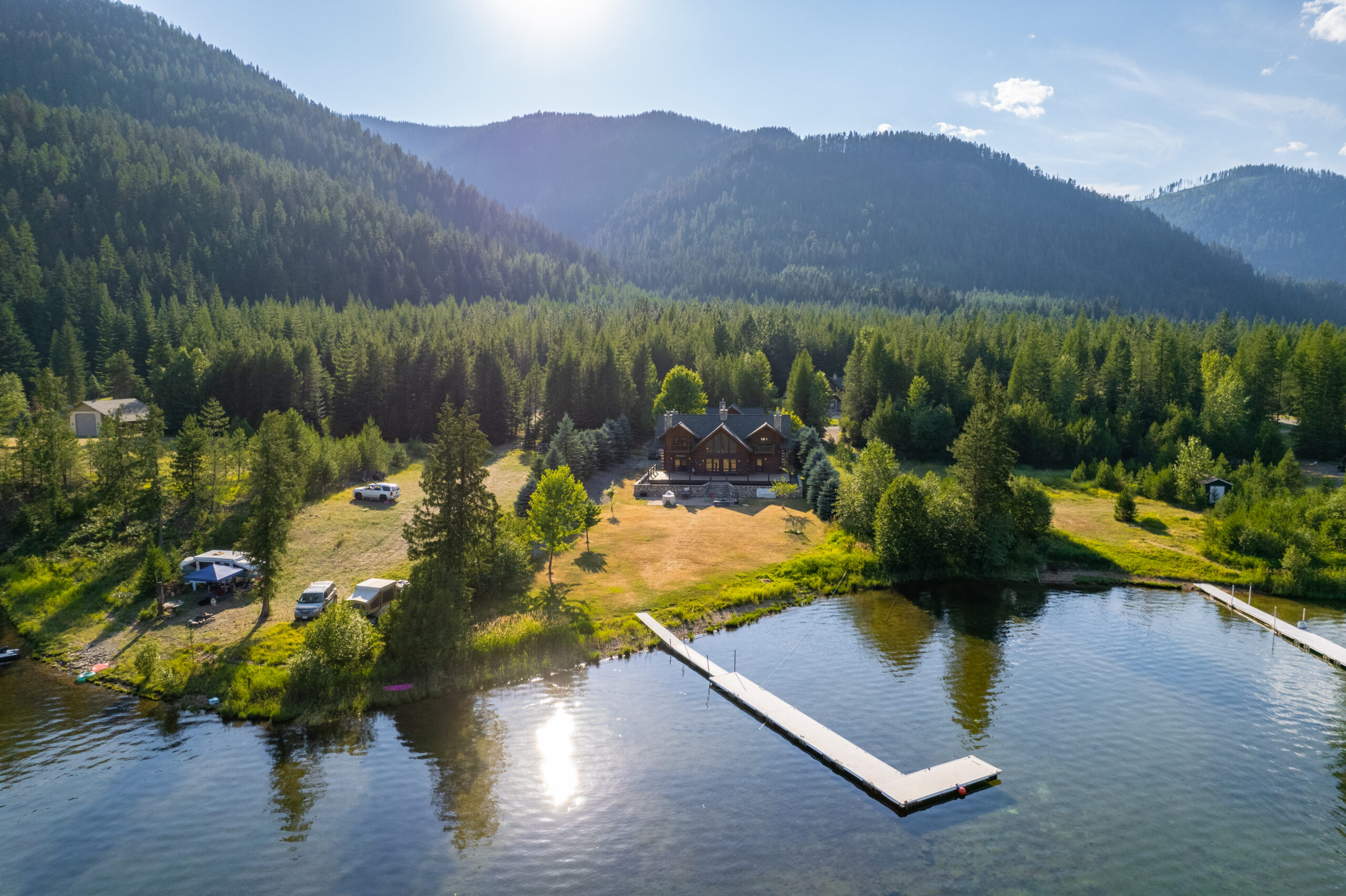 Bull Lake vacation rental — Shangrilog log cabin with private dock and Cabinet Mountains Montana